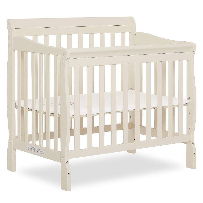 Photo 1 of Dream On Me Aden 4-in-1 Convertible Mini Crib In French White, Greenguard Gold Certified, Non-Toxic Finish, New Zealand Pinewood, With 3 Mattress Height Settings
