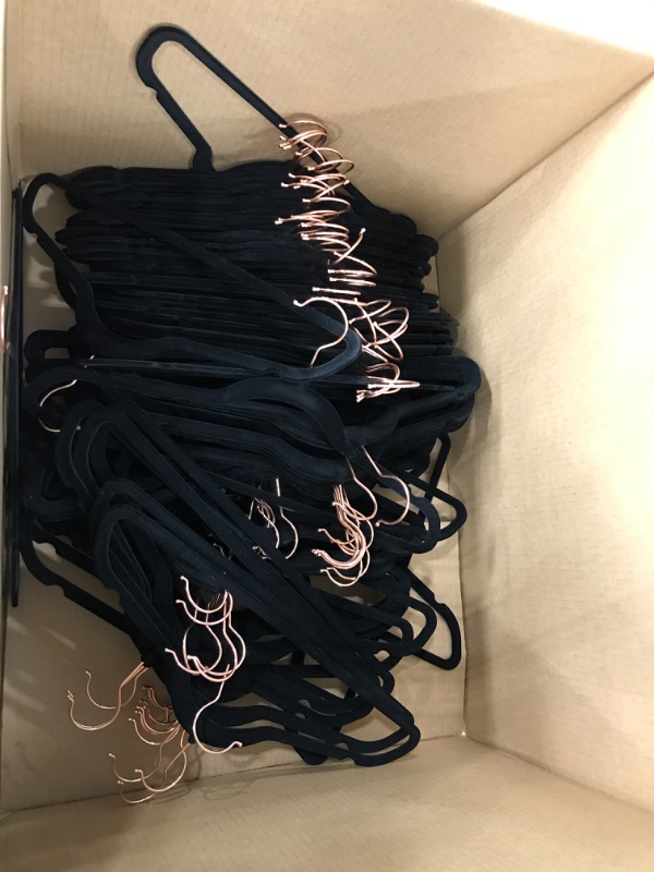 Photo 2 of Amazon Basics Slim, Velvet, Non-Slip Suit Clothes Hangers, Black/Rose Gold - Pack of 100 Black/Rose Gold 100-Pack Suit Hangers