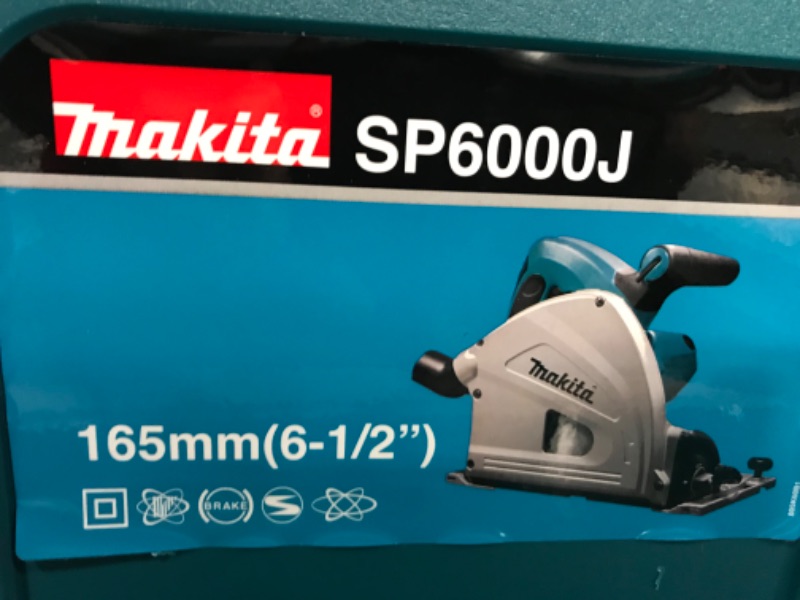 Photo 4 of **see comments**
Makita SP6000J1 6-1/2" Plunge Circular Saw Kit, with Stackable Tool case and 55" Guide Rail, Blue
