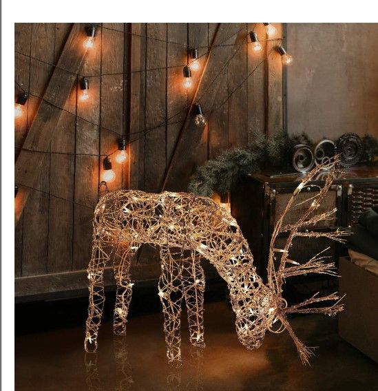 Photo 1 of Alpine Corporation Outdoor/Indoor Rattan Grazing Reindeer with Lights - Christmas and Holiday Decoration for Yard - 24-Inches
