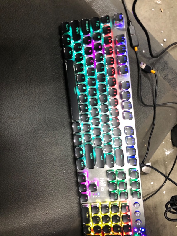 Photo 2 of Fiodio Mechanical Gaming Keyboard with Blue Switches, Removable Hand Rest, LED Rainbow Gaming Backlit, Quick-Response 104 Anti-ghosting Keys, Multimedia Control for PC and Desktop Computer