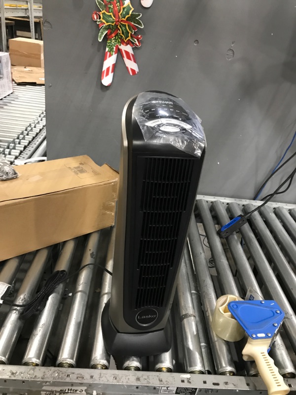 Photo 2 of ** FOR PARTS ONLY OR REPAIR ** Lasko Products Lasko 1500 Watt 2 Speed Ceramic Oscillating Tower Heater with Remote