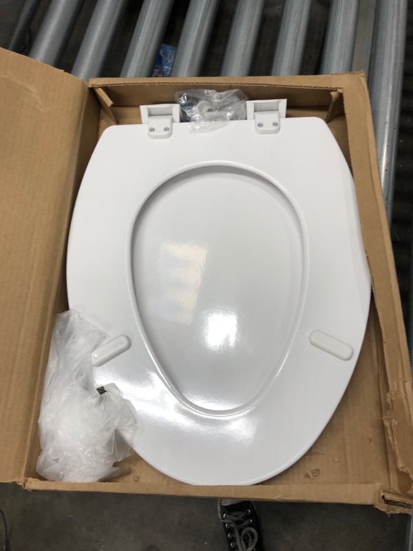 Photo 2 of Bemis 1500EC 390 Toilet Seat with Easy Clean & Change Hinges, Elongated, Durable Enameled Wood, Cotton White & Fluidmaster Tank To Bowl Bolt & Gasket Kit 6102
