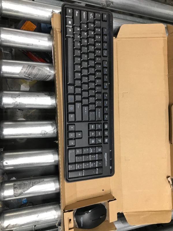 Photo 1 of Amazon Basics Wireless Computer Keyboard and Mouse Combo - Quiet and Compact - US Layout (QWERTY)
