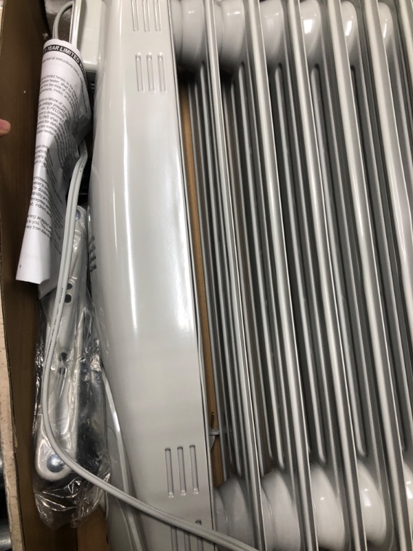 Photo 3 of PELONIS PHO15A2AGW, Basic Electric Oil Filled Radiator, 1500W Portable Full Room Radiant Space Heater with Adjustable Thermostat, White, 26.10 x 14.20 x 11.00 in