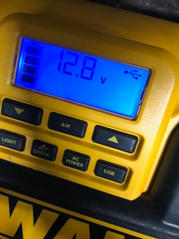 Photo 1 of DEWALT DXAEPS14 1600 Peak Battery Amp 12V Automotive Jump Starter/Power Station with 500 Watt AC Power Inverter, 120 PSI Digital Compressor, and USB Power , Yellow