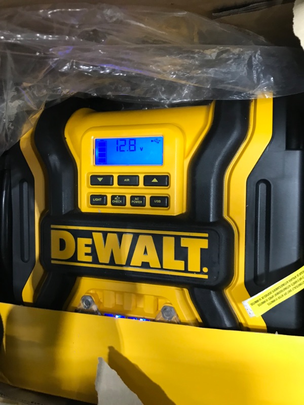 Photo 1 of DEWALT DXAEPS14 1600 Peak Battery Amp 12V Automotive Jump Starter/Power Station with 500 Watt AC Power Inverter, 120 PSI Digital Compressor, and USB Power , Yellow
