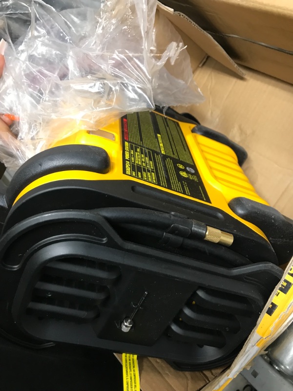 Photo 1 of DEWALT DXAEPS14 1600 Peak Battery Amp 12V Automotive Jump Starter/Power Station with 500 Watt AC Power Inverter, 120 PSI Digital Compressor, and USB Power , Yellow