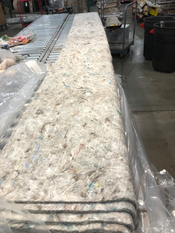 Photo 1 of 12' x 14' carpet padding 