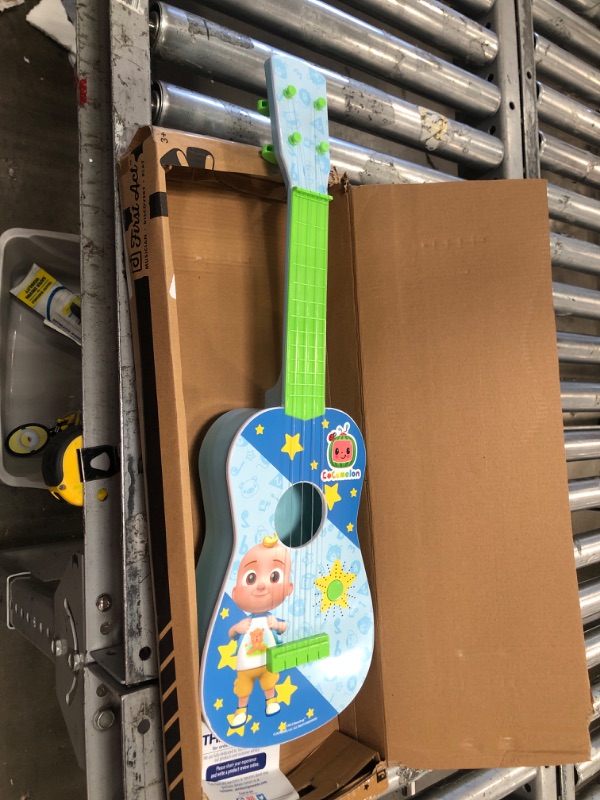 Photo 2 of CoComelon Musical Guitar by First Act, 23.5” Kids Guitar - Plays Clips of The ‘Finger Family’ Song - Musical Instruments for Kids, Toddlers, and Preschoolers