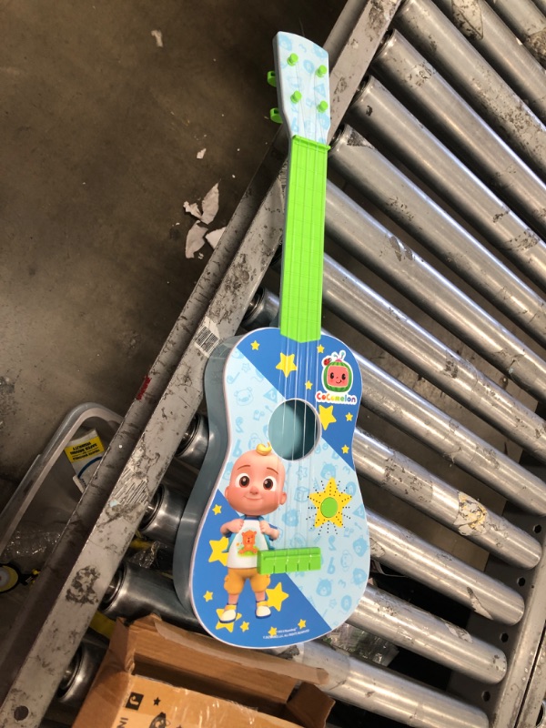 Photo 2 of CoComelon Musical Guitar by First Act, 23.5” Kids Guitar - Plays Clips of The ‘Finger Family’ Song - Musical Instruments for Kids, Toddlers, and Preschoolers