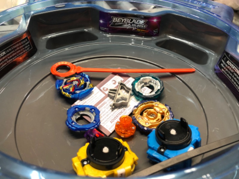 Photo 3 of BEYBLADE Burst Pro Series Evo Elite Champions Pro Set -- Complete Battle Game Set with Beystadium, 2 Battling Top Toys and 2 Launchers Frustration-Free Packaging