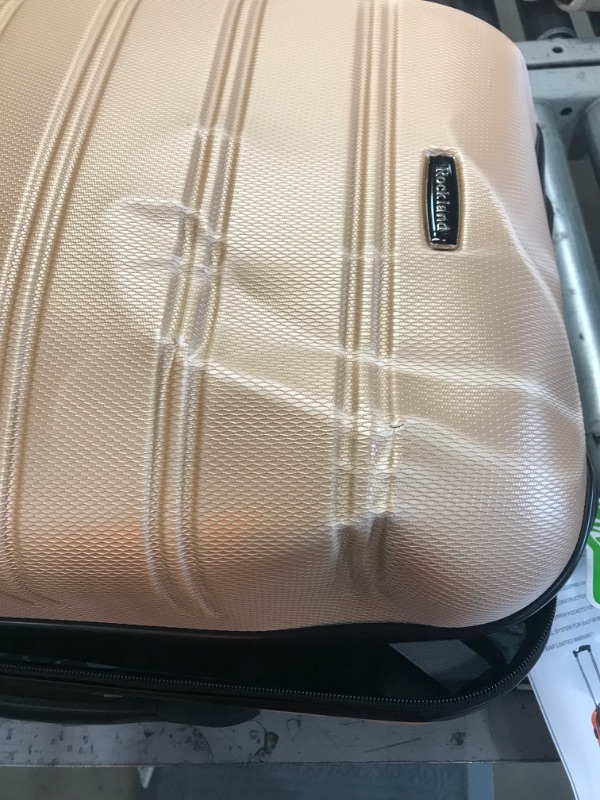 Photo 2 of **** DAMAGED **** **** NEW ****
Rockland Melbourne Hardside Expandable Spinner Wheel Luggage, Champagne, Carry-On 20-Inch
