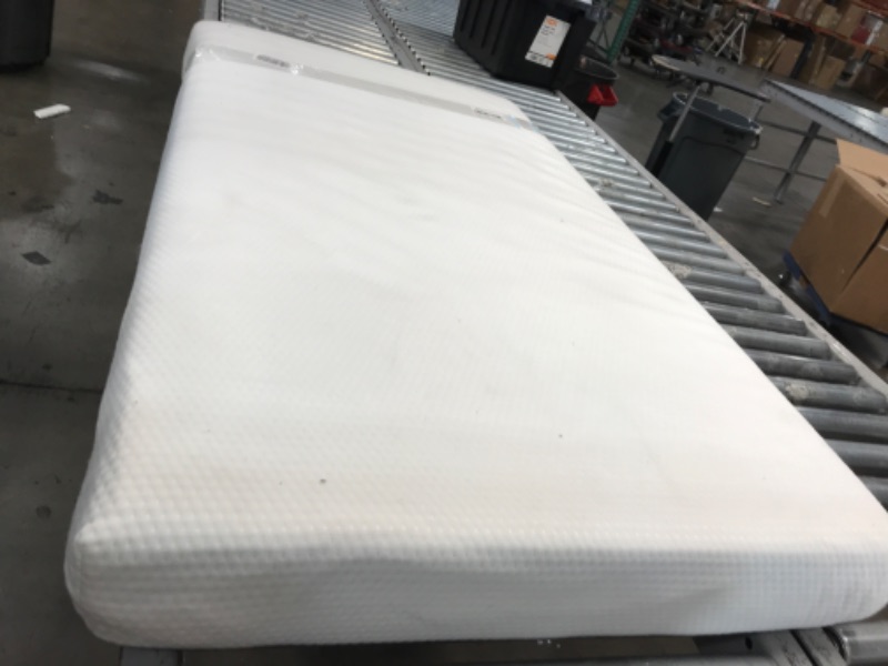 Photo 2 of **MINOR STAINS ON UNIT** Graco Premium Foam Crib & Toddler Mattress – GREENGUARD Gold and CertiPUR-US Certified, 100% Machine Washable, Breathable, and Water-Resistant Cover, Meets All Applicable Category Safety Standards