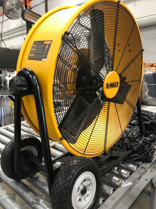 Photo 2 of **NON FUNCTIONAL** DOESNT POWER ON WHEN TESTED** DEWALT Drum Fan High-Velocity Industrial, Drum, Floor, Barn, Warehouse Fan, Heavy Duty Air Mover with Adjustable Tilt & Large Wheel, 24", Yellow DXF2490
