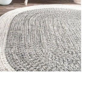 Photo 1 of  braided blueish gray and white border    8' oval   4' 10" wide 