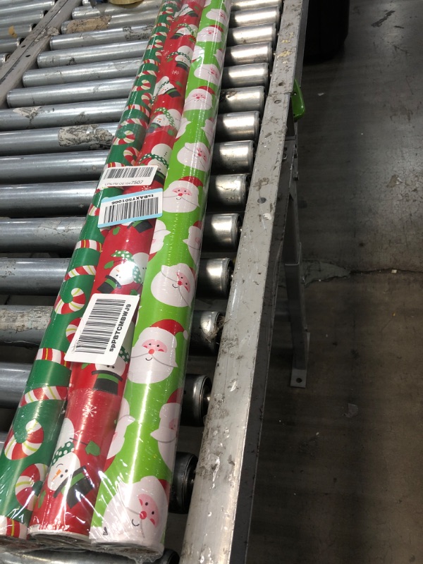 Photo 2 of American Greetings Reversible Christmas Extra-Wide Wrapping Paper Bundle, Santa, Snowmen and Candy Canes (3 Rolls, 120 sq. ft.)