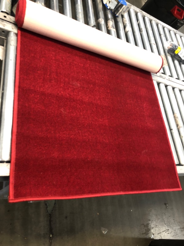 Photo 1 of 2'7" x 8' red rug 