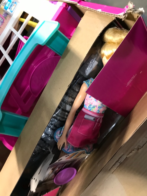 Photo 1 of Barbie Doll and Playset with 30+ Pieces Including Doll Furniture, Cook 'n Grill Restaurant, Open and Close Travel Toy