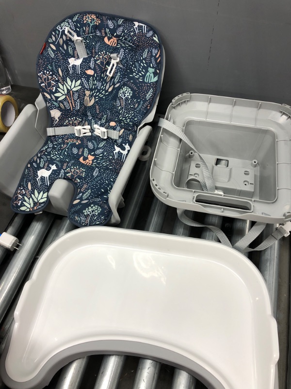 Photo 2 of Fisher-Price Portable Baby High Chair and Toddler Booster Seat with Tray, Space Saver Simple Clean, Moonlight Forest [Amazon Exclusive] [Amazon Exlclusive]