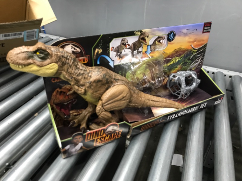 Photo 2 of ?Jurassic World Camp Cretaceous Dinosaur Toy, Stomp 'N Escape Tyrannosaurus Rex Action Figure with Stomping Motion??
