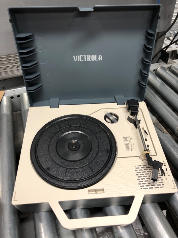 Photo 2 of Victrola Re-Spin Sustainable Suitcase Vinyl Record Player, 3-Speed (33 1/3, 45 & 78 RPM), Belt-Driven Bluetooth Turn Table with Built-in Bass Radiator, 3.5mm Headphone Jack, Gray Gray Re-Spin