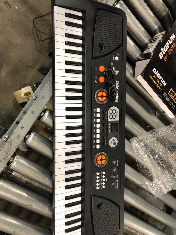 Photo 2 of *** NEW *** **** UNABLE TO TEST ***
61 Key Kids Keyboard Piano Musical Instruments Toys for Kids Ages 5-9 Music Keyboard with Microphone Portable Electronic Piano Keyboard with LED Screen Gifts for 5 6 7 8 9 Year Old Boys Girls 29 * 9 Inches