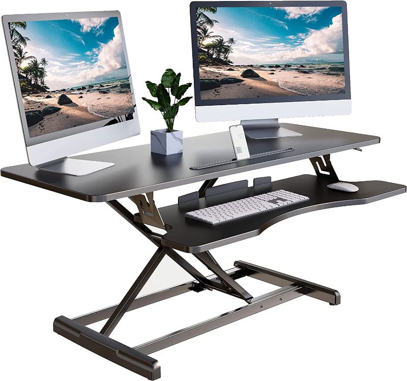 Photo 1 of Lubvlook Standing Desk Converter, 42" Height Adjustable Sit Stand Desk Riser for Dual Monitors with Keyboard Tray, Black
