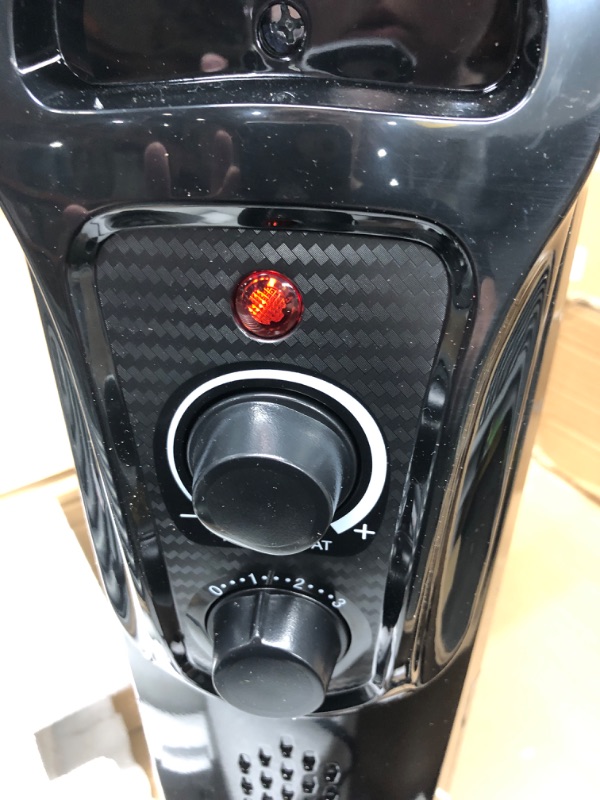 Photo 2 of *** tested*** Amazon Basics Indoor Portable Radiator Heater - Black
