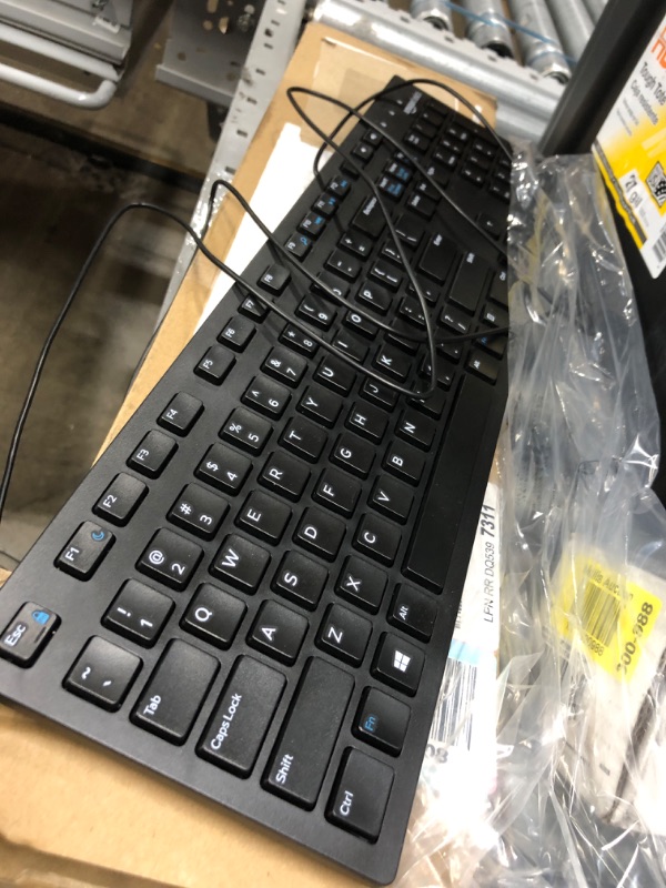 Photo 2 of Amazon Basics Wireless Computer Keyboard and Mouse Combo - Quiet and Compact - US Layout (QWERTY)