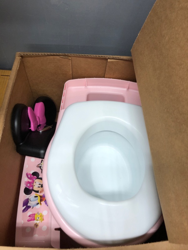 Photo 1 of The First Years Minnie Mouse Imaginaction Potty & Trainer Seat, Pink
