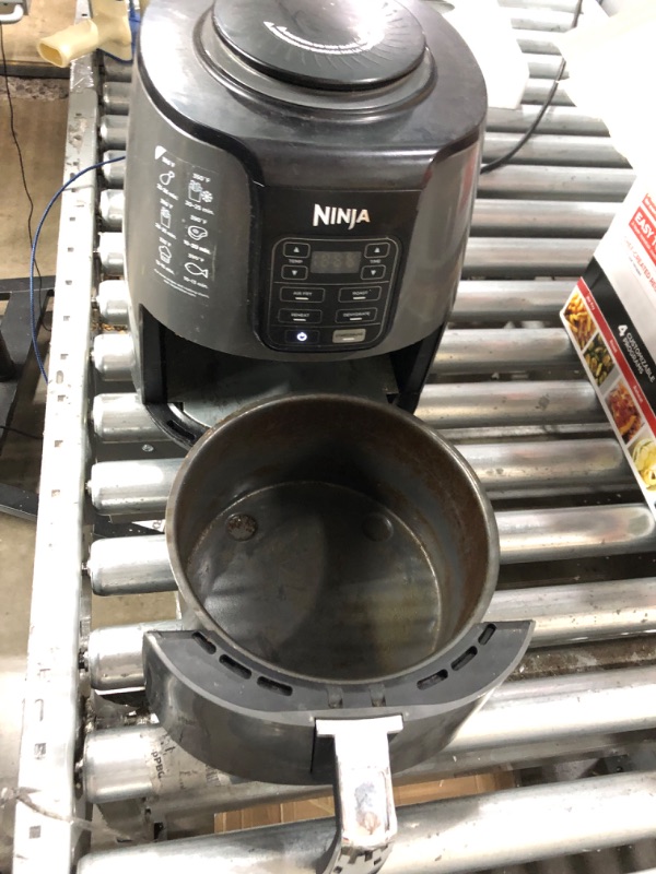 Photo 2 of **Used, needs cleaning**
Ninja AF101 Air Fryer that Crisps, Roasts, Reheats, & Dehydrates, for Quick, Easy Meals, 4 Quart Capacity, & High Gloss Finish, Black/Grey 4 Quarts