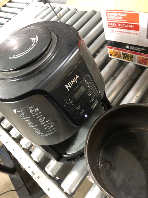 Photo 4 of **Used, needs cleaning**
Ninja AF101 Air Fryer that Crisps, Roasts, Reheats, & Dehydrates, for Quick, Easy Meals, 4 Quart Capacity, & High Gloss Finish, Black/Grey 4 Quarts