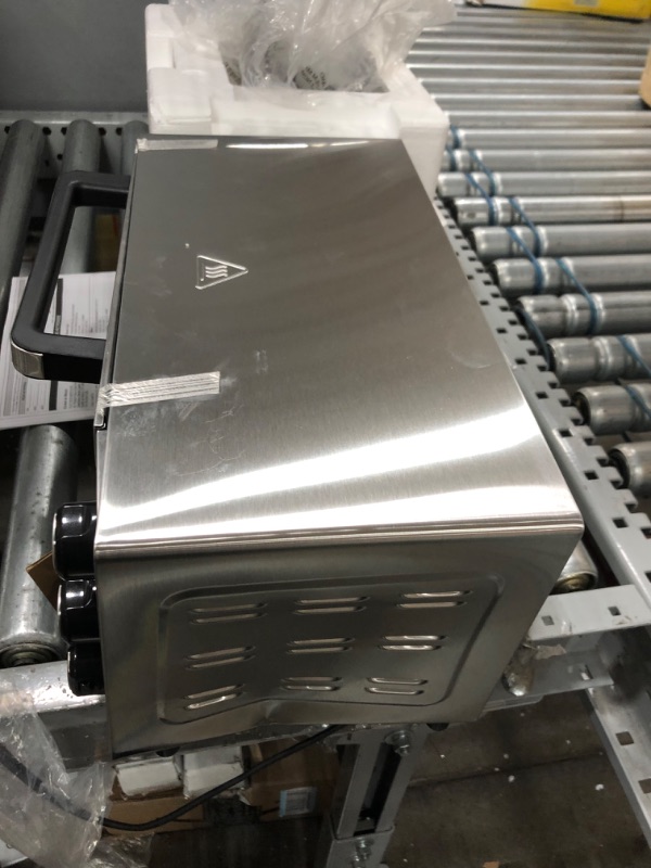 Photo 1 of **MAJOR DENT**
Hamilton Beach Countertop Toaster Oven & Pizza Maker Large 4-Slice Capacity, Stainless Steel (31401)