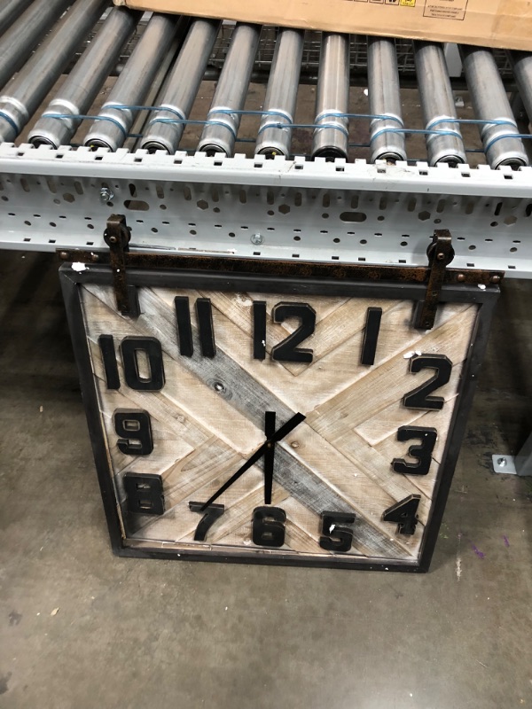 Photo 2 of **minor damage**
Deco 79 Wood Sliding Barn Door Style Wall Clock, 24" x 2" x 27", Brown