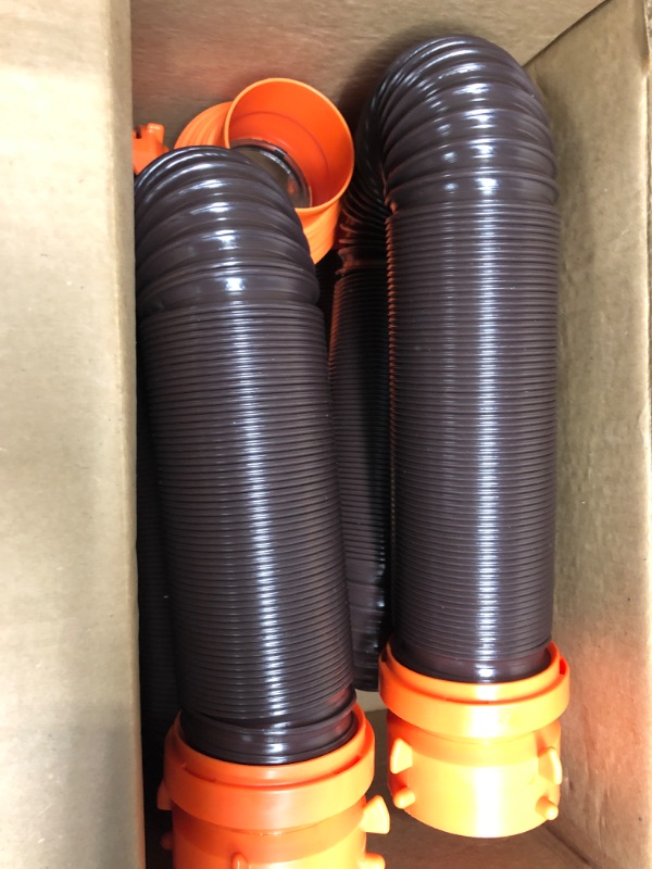 Photo 2 of Camco 20' (39742) RhinoFLEX 20-Foot RV Sewer Hose Kit, Swivel Transparent Elbow with 4-in-1 Dump Station Fitting-Storage Caps Included , Black , Brown 20ft Sewer Hose Kit Frustration-Free Packaging