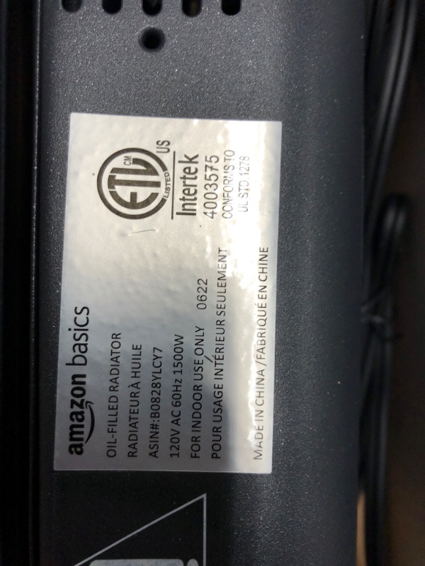Photo 3 of Amazon Basics Portable Radiator Heater with 7 Wavy Fins, Manual Control, Black, 1500W
