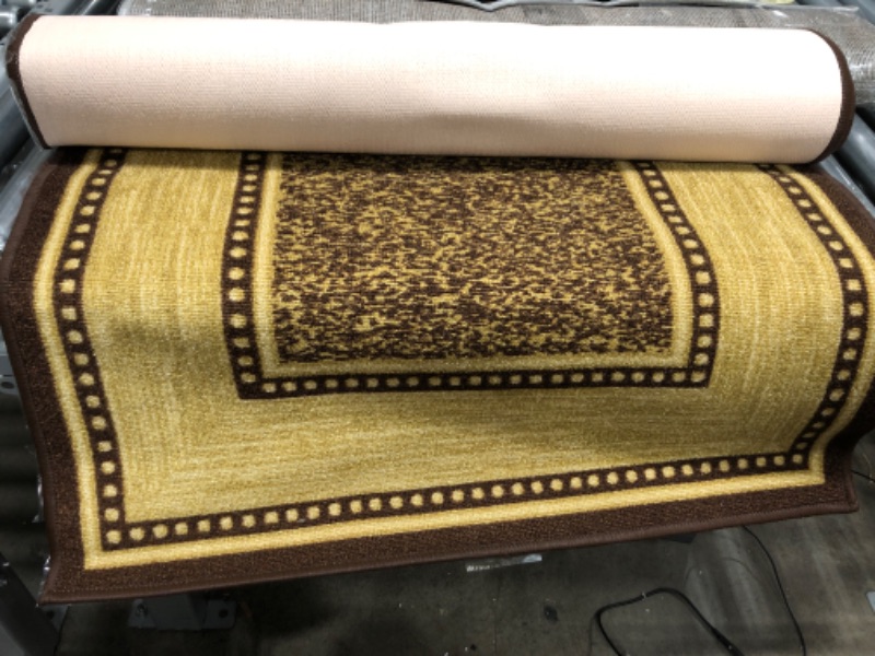 Photo 1 of 2'7X6FT BROWN AREA RUG 