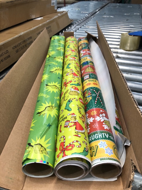 Photo 2 of American Greetings Christmas Wrapping Paper with Cut Lines Bundle, The Grinch (3 Rolls, 105 sq. ft.)