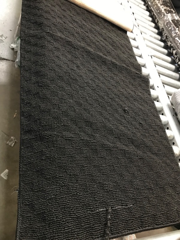 Photo 1 of 24IN X 71IN BLACK CHECKERED AREA RUG RUNNER 