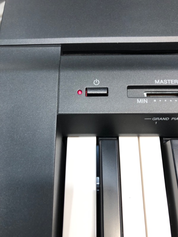 Photo 1 of YAMAHA P71 88-Key Weighted Action Digital Piano with Sustain Pedal and Power Supply 
