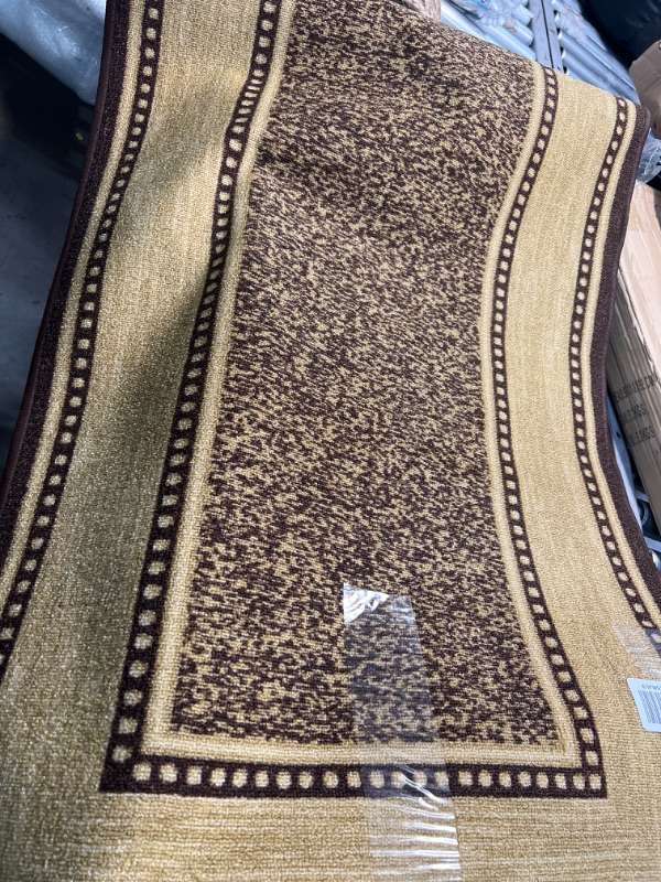 Photo 1 of 2ft x6ft runner rug -brown 