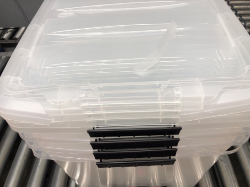 Photo 3 of IRIS USA 72 Qt. Plastic Storage Bin Tote Organizing Container with Durable Lid and Secure Latching Buckles, Stackable and Nestable, 4 Pack, clear with Black Buckle g) 72 Qt. - 4 Pack