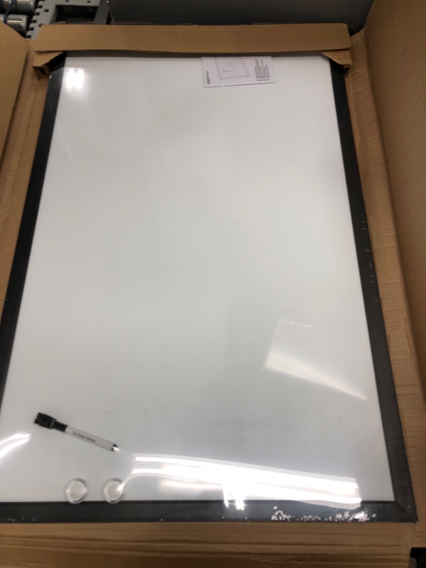 Photo 2 of Amazon Basics Magnetic Dry Erase White Board, 35 x 23-Inch Whiteboard - Black Wooden Frame
