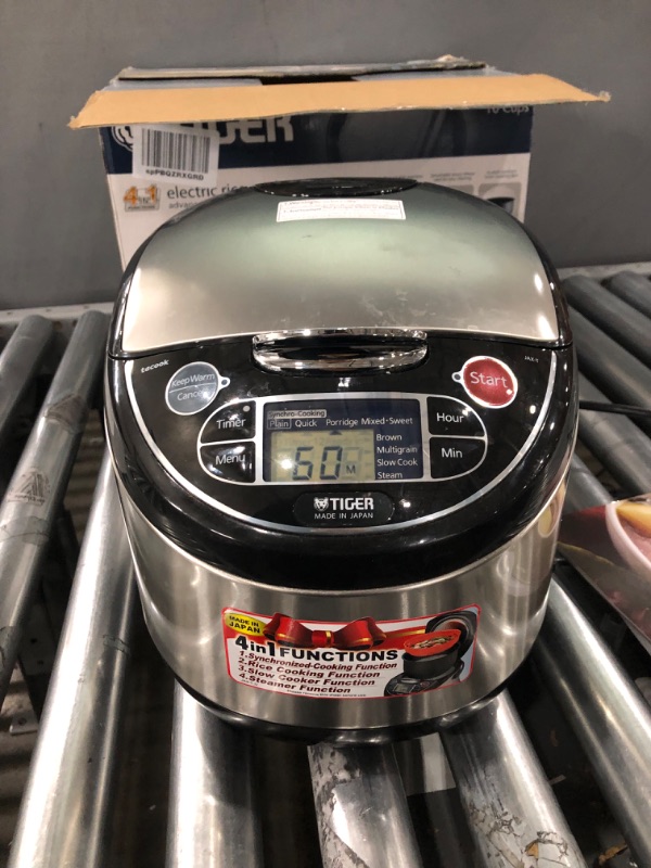 Photo 2 of Tiger JAX-T18U-K 10-Cup (Uncooked) Micom Rice Cooker with Food Steamer & Slow Cooker, Stainless Steel Black 10 Cup (Uncooked)