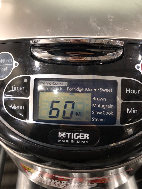 Photo 4 of Tiger JAX-T18U-K 10-Cup (Uncooked) Micom Rice Cooker with Food Steamer & Slow Cooker, Stainless Steel Black 10 Cup (Uncooked)