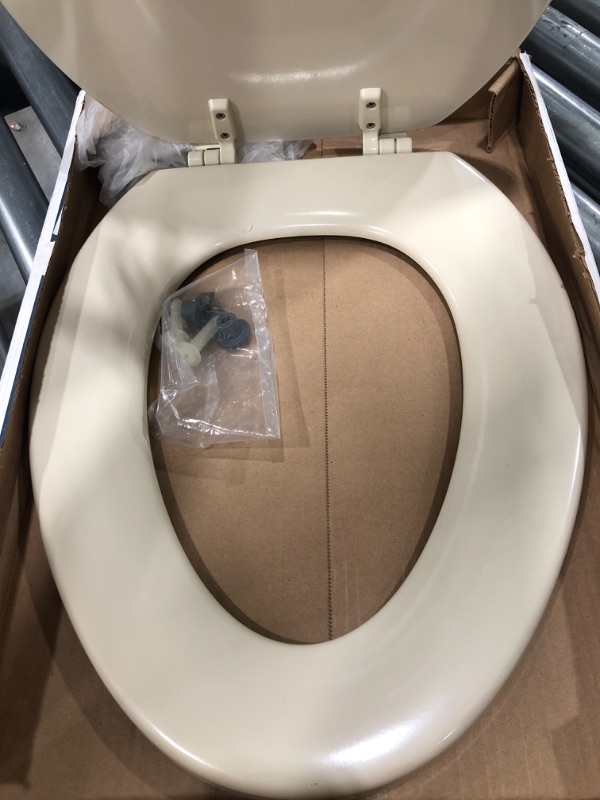 Photo 4 of KOHLER K-4647-47 Stonewood Molded-Wood with Color-Matched Plastic Hinges Elongated Toilet Seat, Almond Almond Elongated Toilet Seat