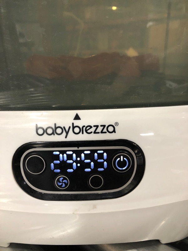 Photo 2 of Baby Brezza Baby Bottle Sterilizer and Dryer Advanced – Electric Steam Sterilization Machine – Universal Sterilizing for All Bottles: Plastic + Glass + Pacifiers + Breast Pump Parts - HEPA Filtration
