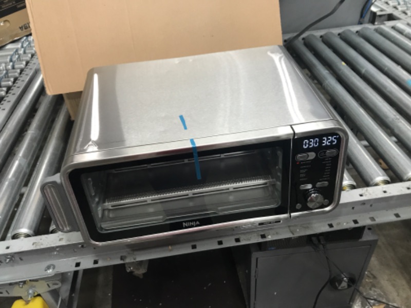 Photo 3 of Ninja SP301 Dual Heat Air Fry Countertop 13-in-1 Oven with Extended Height, XL Capacity, Flip Up & Away Capability for Storage Space, Silver (RENEWED)
Serial Number: Z27Q1505Z1K9