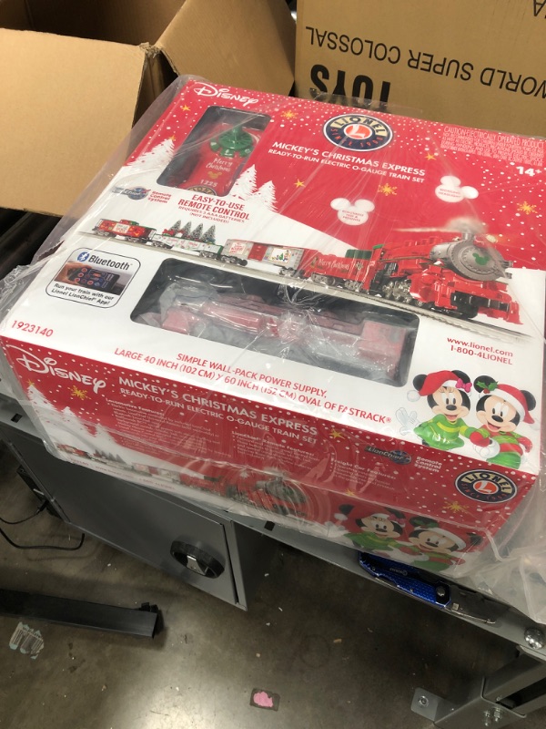 Photo 2 of *item is SEALED, has NOT been opened*
Lionel Disney Christmas LionChief 0-8-0 Set with Bluetooth Capability, Electric O Gauge Model Train Set with Remote